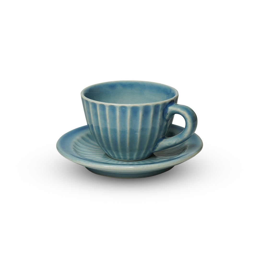 Yellow Marigold Cup & Saucer – Fluid Blue Set of 2, artisan ceramic drink-ware for stylish coffee or tea service.