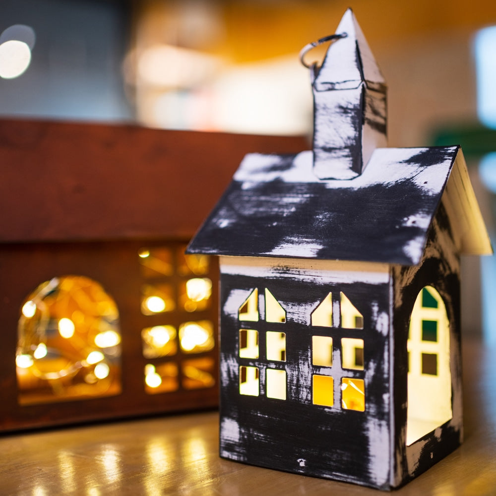 Yellow Marigold black metal hanging birdhouse lantern — detailed view of metalwork, glass panes and rustic black finish