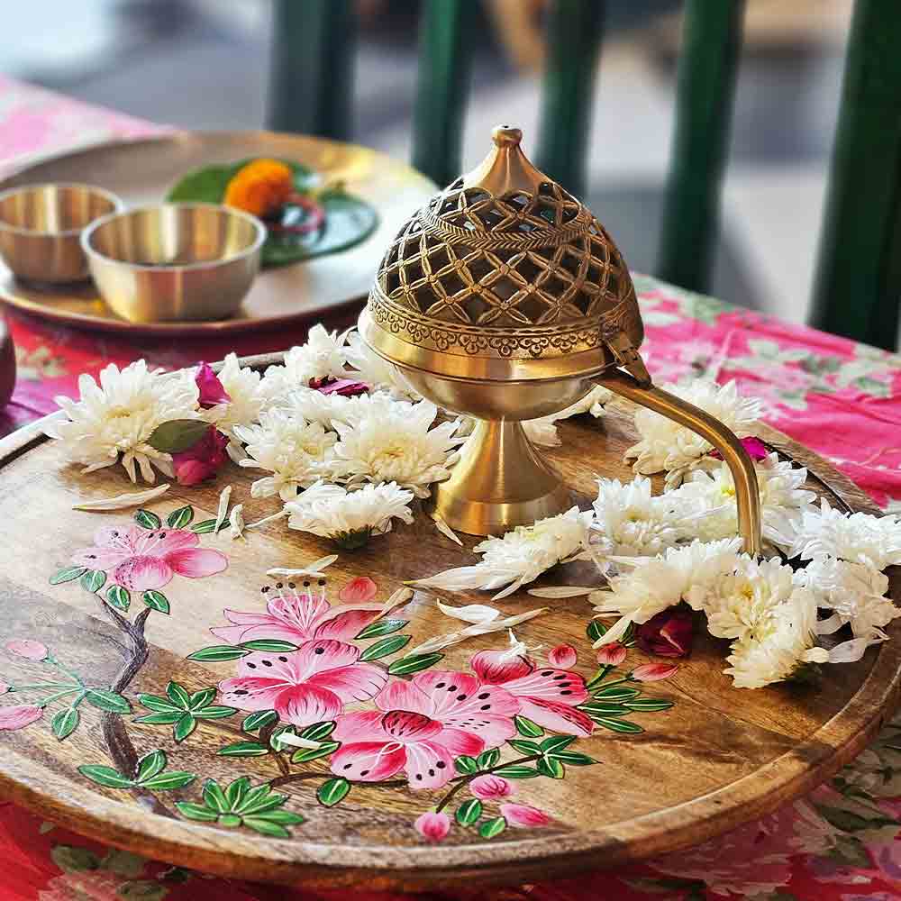 Yellow Marigold Akhand Chirag Dhuni brass lamp — traditional brass lamp on plain background