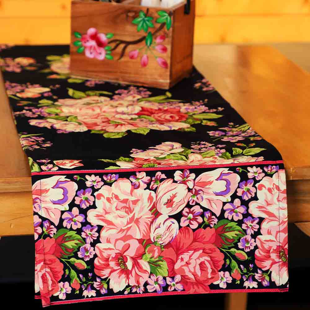 Yellow Marigold Blanche Black Floral table runner — black floral-print runner laid flat on a dining table