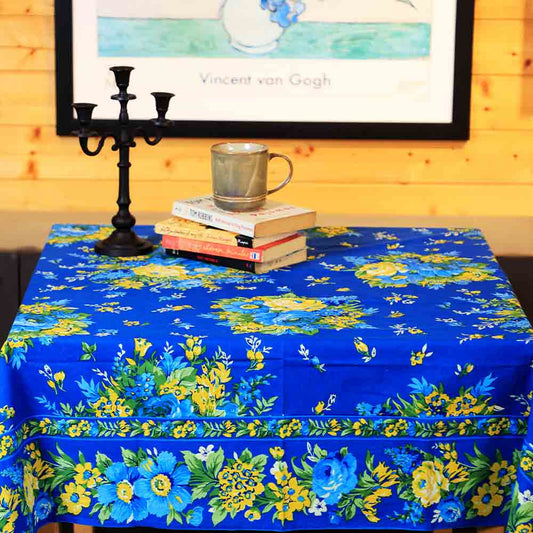 Yellow Marigold Avonlea Blue table cover — close-up showing handcrafted fabric texture and floral pattern detail