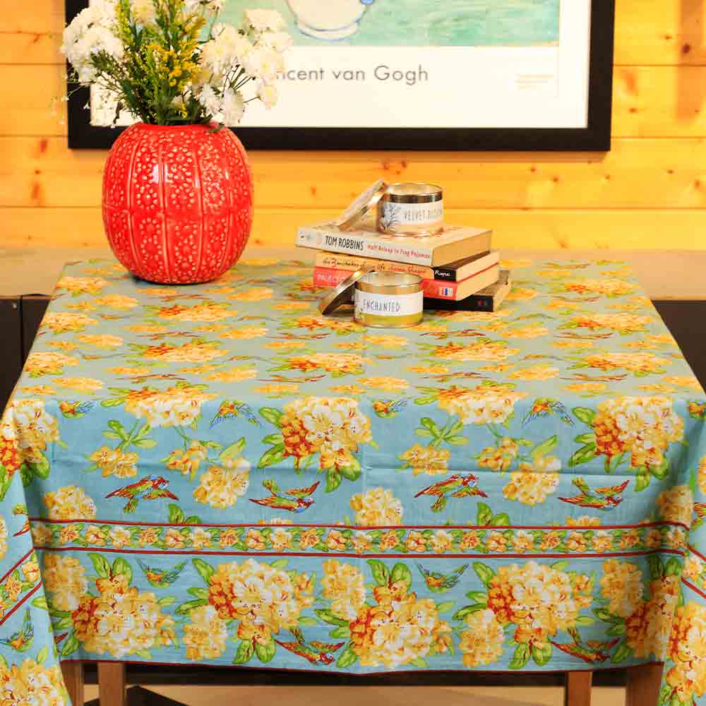 Yellow Marigold Valley of Flowers Mist table cover — floral-print table cover spread flat on a dining table