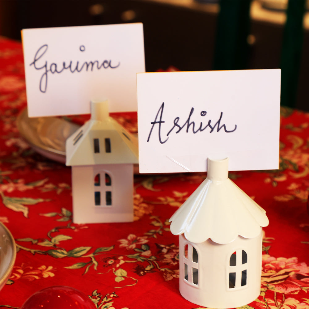 Yellow Marigold Matte Edit round metal name tag holder displayed on a desk or shelf with name tags — sleek office or home décor accessory