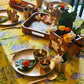 Yellow Marigold Uma Kansa dinner set — close‑up showing handcrafted kansa metal texture and finish of plates and bowls